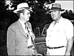 Loy Harrison [right] with FBI agent